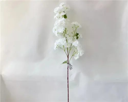 Jak se cherry květy hedvábí replikují jemnou texturu skutečných okvětních lístků Sakura?